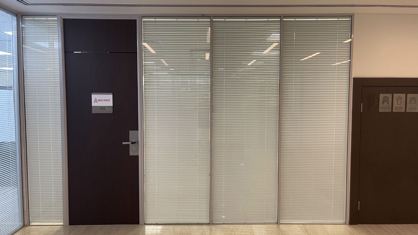Office 310 door with the Red Rock plate